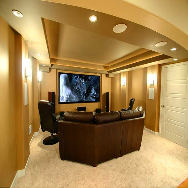 A home entertainment room with proper speakers, lighting, etc.