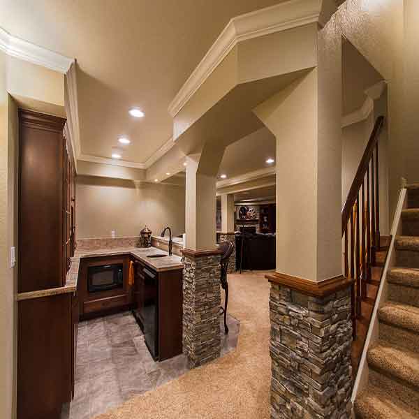 A designed-and-built archway leading into main basement