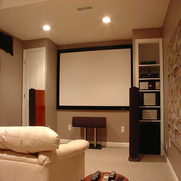 Mounted projector screen with custom shelving to the side