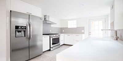 Brand new kitchen with stylish countertops and new appliances